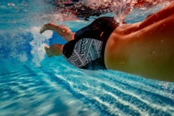 Zone3 - Kona Men's Tribal Print Speed Jammers - Black/White/Orange - 2023 -ORCA Shop Zone3 Pool Nov2020 JamesMitchell 0578 42796.1684752862