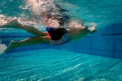 Zone3 - Kona Men's Tribal Print Speed Jammers - Black/White/Orange - 2023 -ORCA Shop Zone3 Pool Nov2020 JamesMitchell 0635 85283.1684752862