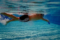 Zone3 - Kona Men's Tribal Print Speed Jammers - Black/White/Orange - 2023 -ORCA Shop Zone3 Pool Nov2020 JamesMitchell 0685 30230.1684752862