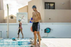 Zone3 - Kona Men's Tribal Print Speed Jammers - Black/White/Orange - 2023 -ORCA Shop Zone3 Pool Nov2020 JamesMitchell 2939 15989.1684752862