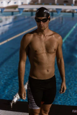 Zone3 - Kona Men's Tribal Print Speed Jammers - Black/White/Orange - 2023 -ORCA Shop Zone3 Pool Nov2020 JamesMitchell 3289 64026.1684752862